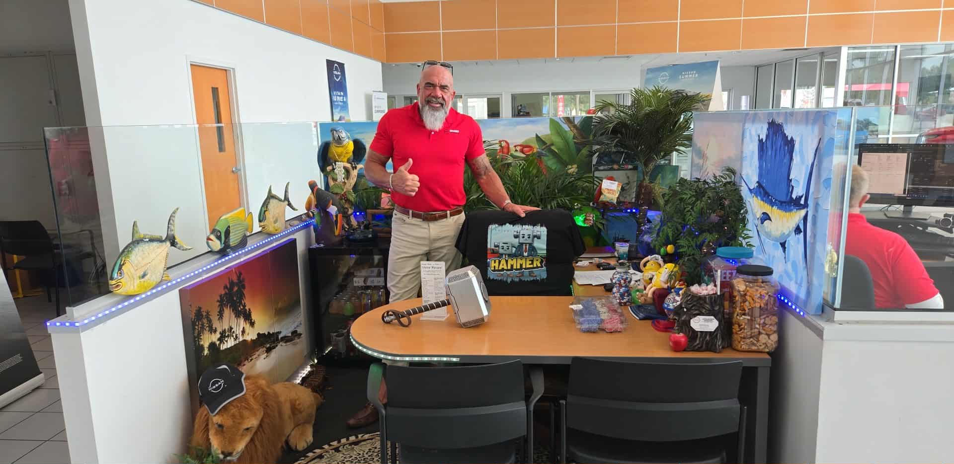 Hammer in his personalized fitness space with motivational artwork and fitness equipment