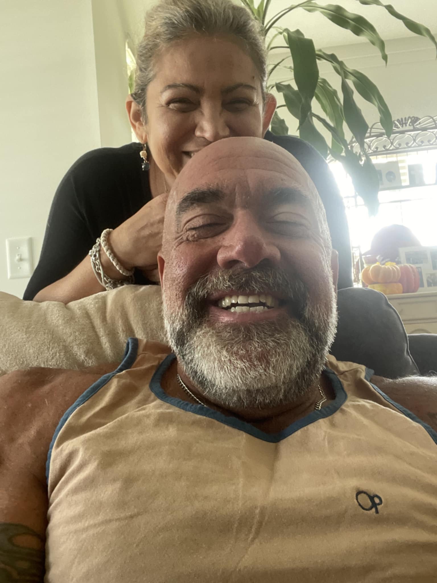 Hammer relaxing at home with his wife, showing their comfortable domestic life